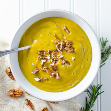 Acorn Squash Soup with Rosemary and Pecans - a slow cooker and high-speed blender make this vegan and gluten free acorn squash soup a cinch to prepare - the sweet and savory recipe yields about 4 cups | VeggiePrimer.com