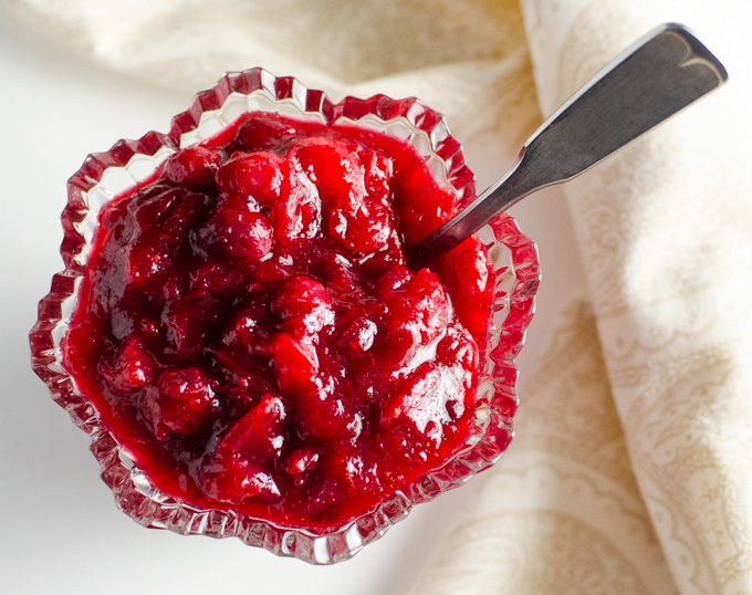 Easy Orange Cinnamon Cranberry Sauce - this delicious whole berry recipe is made with maple syrup and takes about 10 minutes to prepare | VeggiePrimer.com