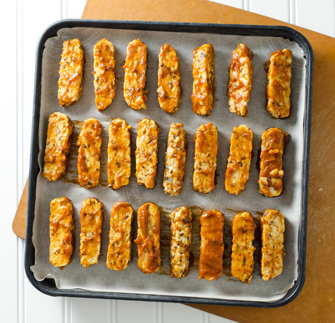 Baked BBQ Tempeh - this quick and easy recipe makes a delicious meat substitute in a variety of gluten-free vegan dishes | VeggiePrimer.com