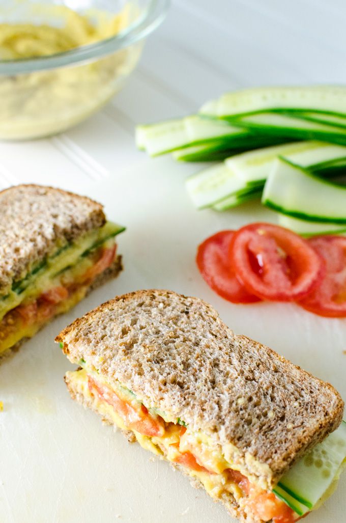 Cucumber Sandwich with Turmeric White Bean Spread - this gluten-free vegan recipe makes a clean, quick and easy lunch. Adding a slice of onion will provide an extra bit of zip | VeggiePrimer.com